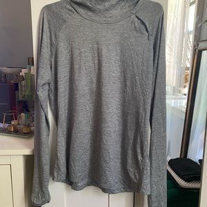 Nike gray long sleeve light weight hoodie. Dry fit with thumb hole. Size L.